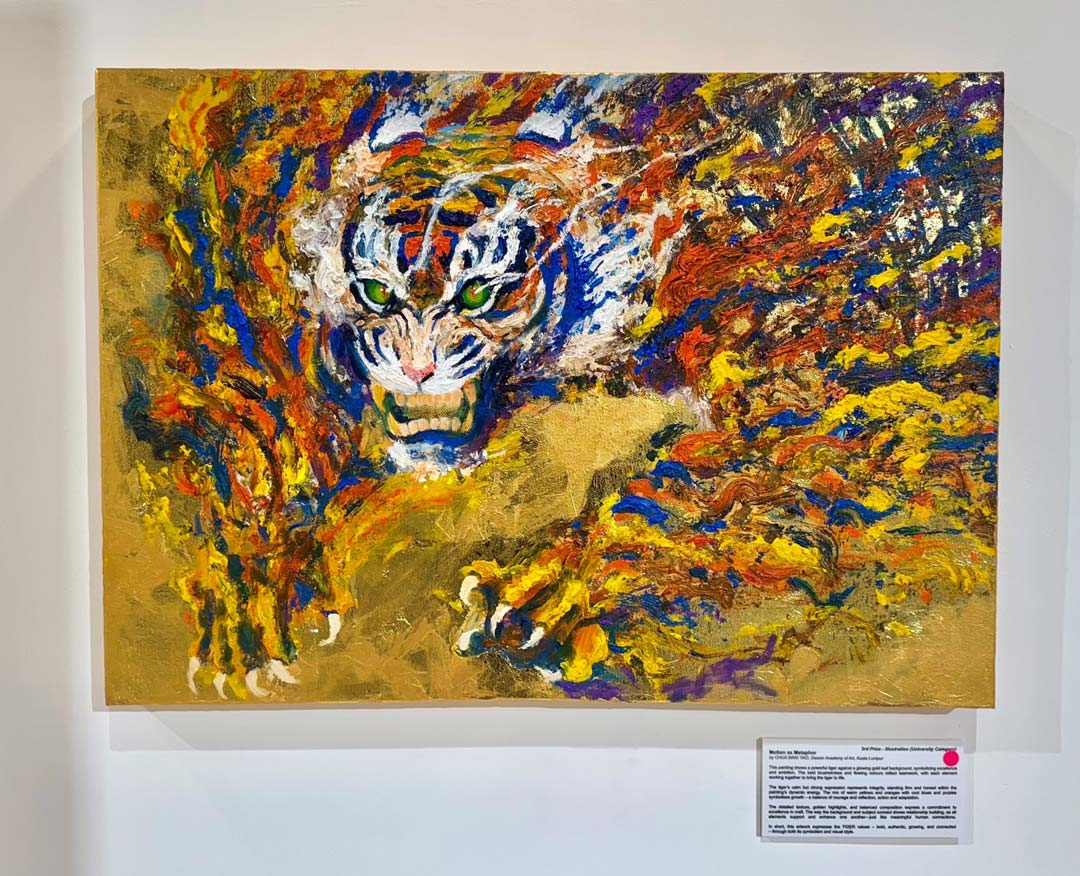 ‘Motion as Metaphor Endangered’ by Chua Bing Yao from Dasein Academy of Art, the Third Prize Winner of the University (Illustration) category - A powerful tiger against a glowing gold leaf background, symbolising excellence and ambition. The bold brushstrokes and flowing colours reflect teamwork, with each element working together to bring the tiger to life. The artwork expresses the bold, authentic, growth and connection through its symbolism and visual style.